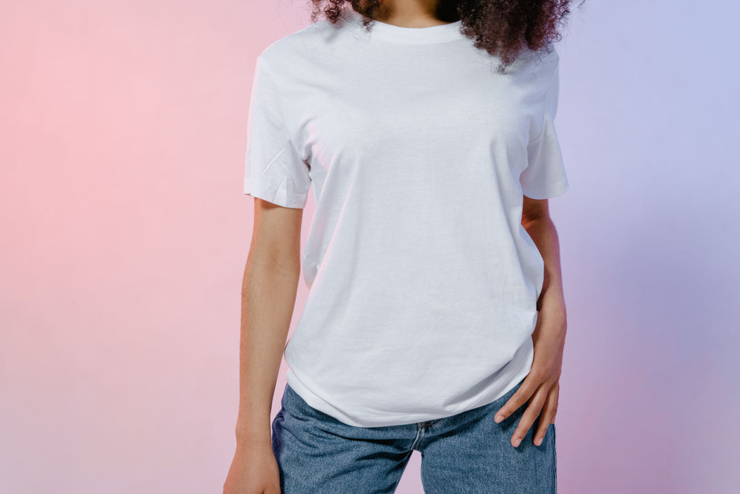 Close-Up Shot of a Person Wearing White Shirt