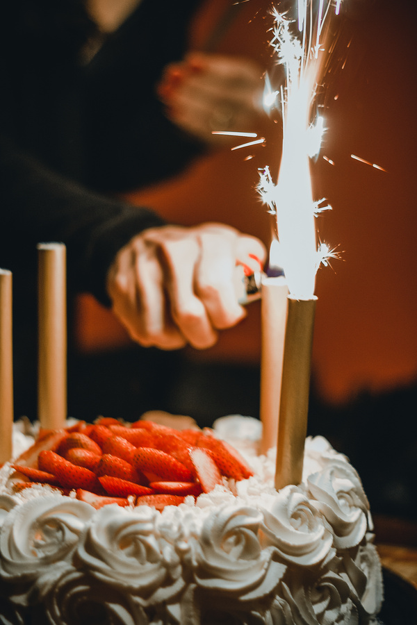 Person Lighting The Sparklers